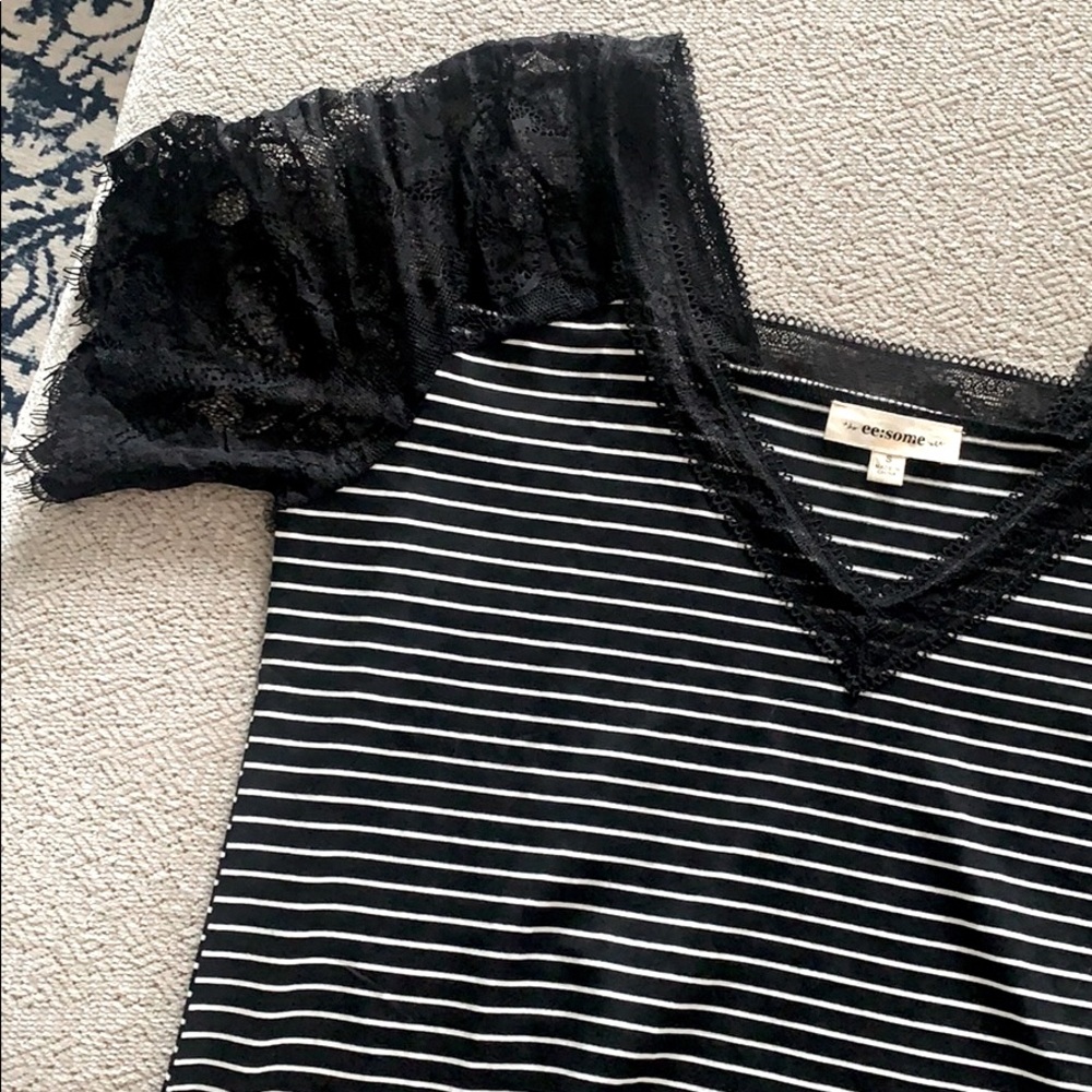 Lace, striped V-neck shirt. Black and white